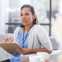 Patient discussing medication with her doctor